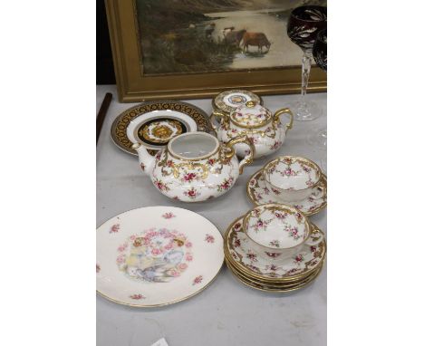 A TEAPOT, LIDDED SUGAR BOWL, CUPS AND SAUCERS, ALL HANDPAINTED WITH FLORAL AND GILT PATTERN - TEAPOT IS MISSING ITS LID, PLUS