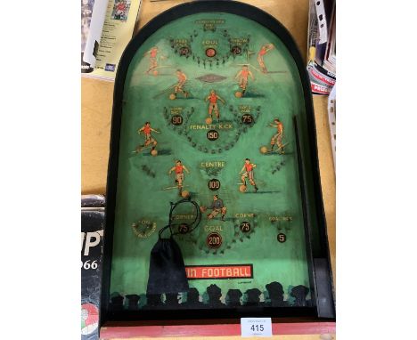 A 1950'S PINBALL FOOTBALL GAME, COMPLETE WITH BALLS 