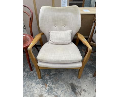 A RETRO FIRESIDE CHAIR WITH L SHAPED BUTTON BACK 