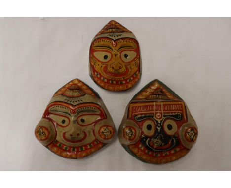 THREE AZTEC STYLE PAPIER MACHE MASKS 
