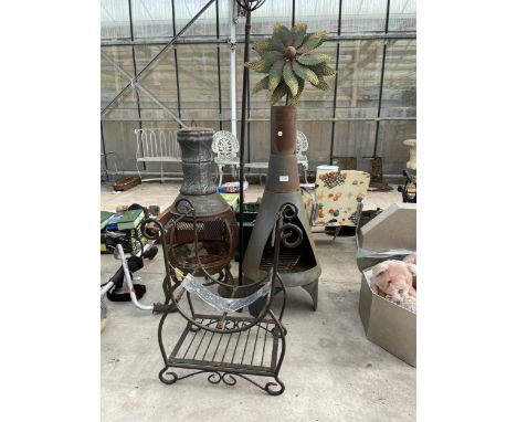 AN ASSORTMENT OF GARDEN ITEMS TO INCLUDE A METAL CHIMENIA, A LOG RACK AND A CANDLESTICK ETC 