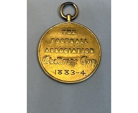 AN 1883/4 F.A. CUP FINAL WINNER'S MEDAL. THIS MEDAL IS TESTED TO 22 CARAT GOLD AND WAS AWARDED TO JOE SOWERBUTTS (FORWARD) OF