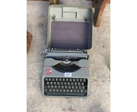 A VINTAGE EMPIRE TYPEWRITER WITH CARRY CASE 