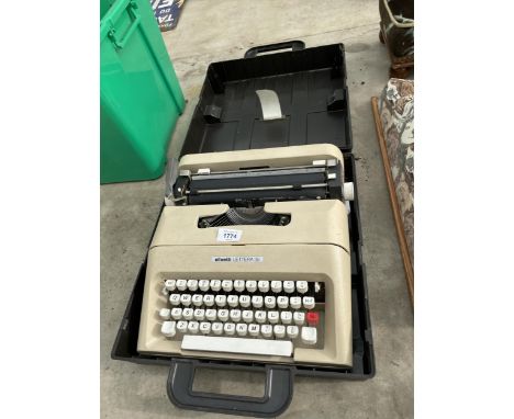 A RETRO OLIVETTI LETTERA 35 TYPEWRITER WITH CARRY CASE 