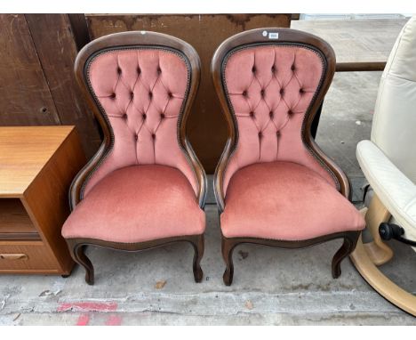A PAIR OF VICTORIAN STYLE BUTTON BACK LOUNGE CHAIRS 