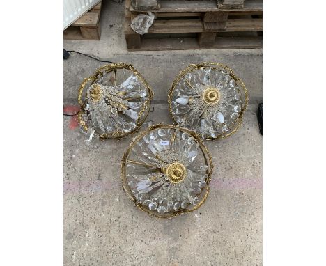 THREE VINTAGE AND DECORATIVE BRASS LIGHT FITTINGS 