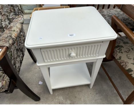 A WHITE BEDSIDE TABLE 