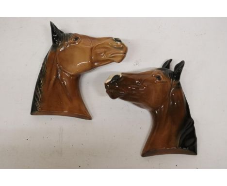 A PAIR OF CERAMIC HORSE PLAQUES 