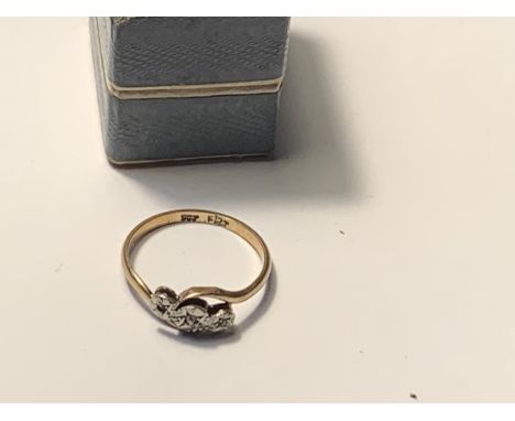 A 9 CARAT GOLD AND DIAMOND RING SIZE P/Q GROSS WEIGHT 1.8 GRAMS IN A PRESENTATION BOX 