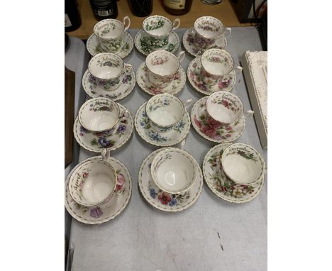 A COMPLETE SET OF ROYAL ALBERT FLOWER OF THE MONTH CUP AND SAUCERS 