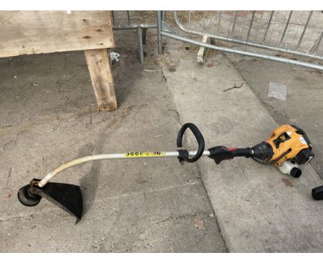 A JCB PETROL ENGINE GRASS STRIMMER 