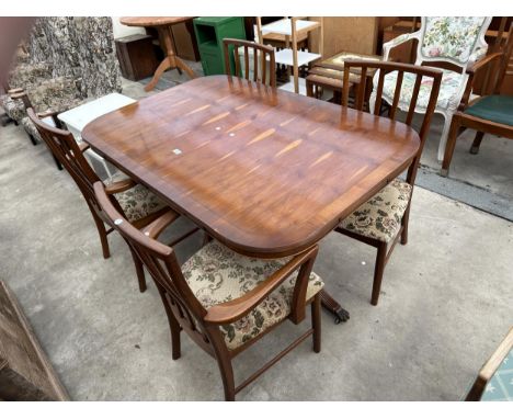 A YEW WOOD TWIN PEDESTAL DINING TABLE 54" X 36" AND FOUR RETRO TEAK DINING CHAIRS ( STYLE UPHOLSTERED) TWO BEING CARVERS 
