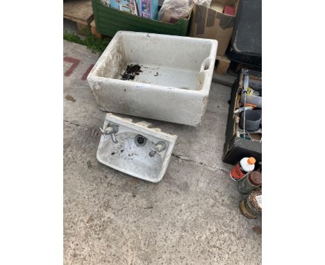 A WHITE BELFAST SINK AND A FURTHER BATHROOM SINK 