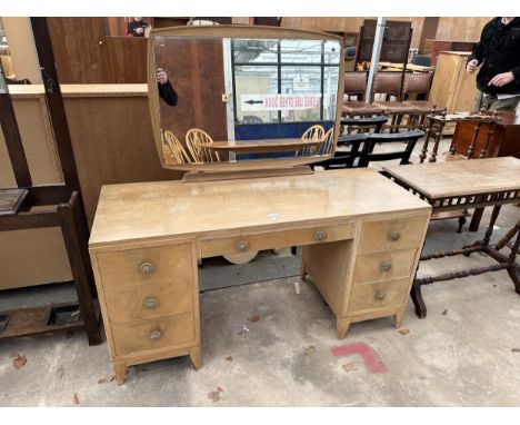 A MID 20TH CENTURY SATINWOOD TWIN PEDESTAL DRESSING TABLE BEARING BERIK FURNITURE LABEL 