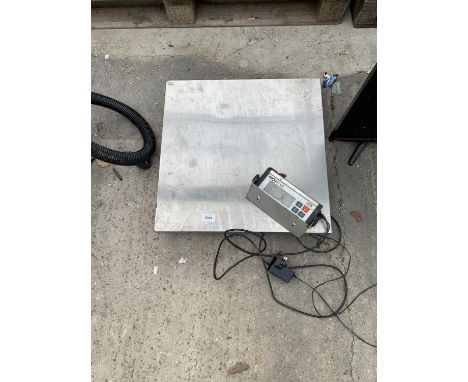 A SET OF ELECTRIC WEIGH SCALES WITH DIGITAL SCREEN 