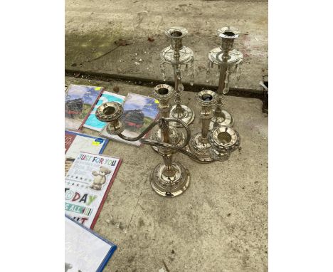 TWO PAIRS OF SILVER PLATED CANDLESTICKS AND A FURTHER TWISTED TWO BRANCH CANDLESTICK 