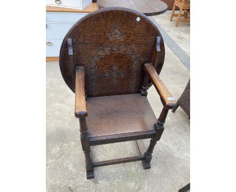 AN EARLY 20TH CENTURY OAK MONKS CHAIR WITH FOLD OVER TABLE TOP 