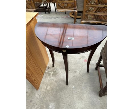 A MAHOGANY AND CROSS BANDED REPRODUX DEMI LUNE TABLE 24" WIDE 