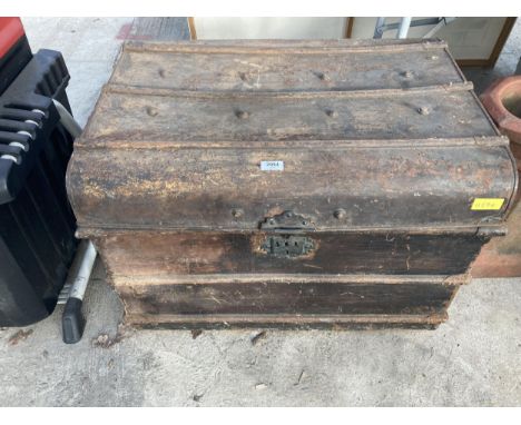A LARGE VINTAGE METAL STORAGE TRUNK 