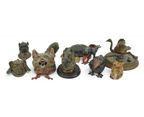 A collection of nine 19th and 20th century novelty animal bronze and metal ink wells, including a Martin Brothers-style ‘Wall