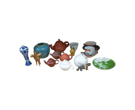 A group of Chinese and Japanese ceramics to include Yixing teapots, porcelain cups and saucers, a blue and white vase and a t