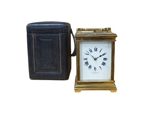 A late 19th century French brass cased eight day repeating carriage clock, Wilson &amp; Sharp, in leather case. Condition - f