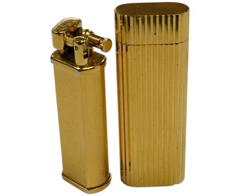 A Dunhill Sylphida lighter and Cartier lighter, numbered 88821. Condition - fair Dunhill without flint so not striking.  Cart