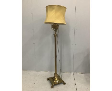 An Edwardian brass telescopic lamp standard, converted to electricity, height 180cm including shade. Condition - fair to good