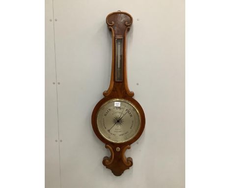 P. Cattaneo, High Street, Croydon. An early Victorian flamed mahogany wheel barometer, height 114cm. Condition - fair to good