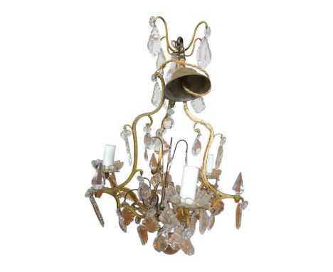 A French gilded three light chandelier with crystal drops, circa 1930's, wired, overall 68cm high, 39cm wide. Condition- fair
