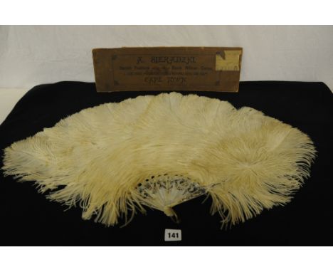 Large (34" across) 19th century Ostrich feather and mother of pearl fan in fine condition in worn box printed A Sieradzki, Ca