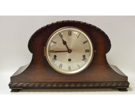An oak mantel clock