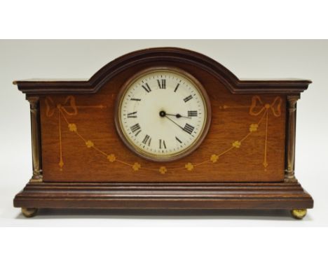 An Edwardian mahogany mantel clock, French movement, architectural pediment, enamel face, Roman numerals inlaid with satinwoo