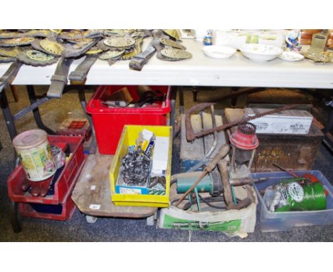 A military metal storage box, drills, tilley style lamp, oil cans, inspection trolley, etc