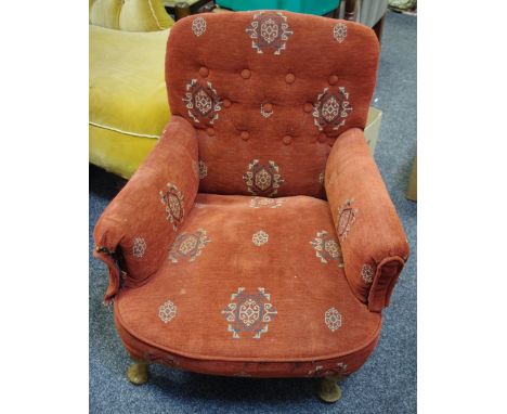A child's button back armchair