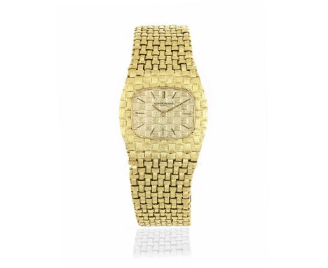 Vacheron Constantin. An 18K gold manual wind textured bracelet watchReference: 33020PDate: Circa 1990Movement: 17-jewel Cal.1