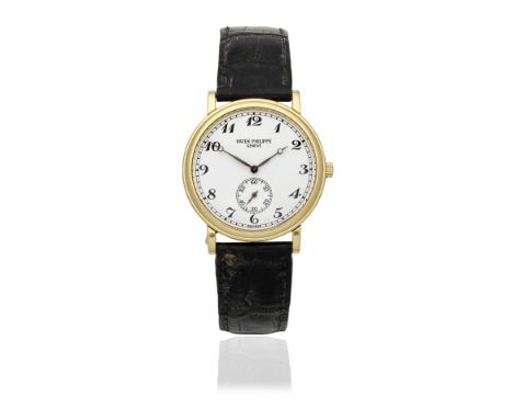 Patek Philippe. An 18K gold manual wind wristwatchModel: CalatravaReference: 5022Date: Circa 2000Movement: 18-jewel Cal.215 m