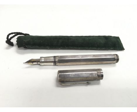 A Montegrappa silver fountain pen.