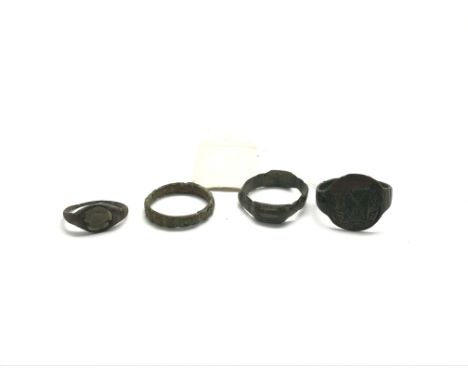 Four roman rings. One is a 3rd - 4th century roman enamelled ring, and three others as pictured.