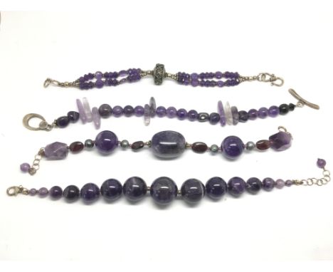 Four amethyst bracelets.