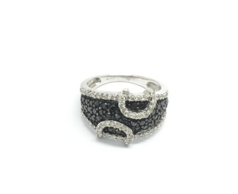 A 9ct white gold African black diamond ring, approx 4.9g and approx size N.