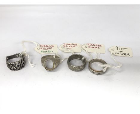 Three sterling silver rings and one 9ct gold and silver ring with white stones, some missing. NO RESERVE.