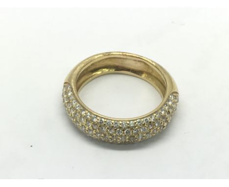 An 18ct gold ring set with diamonds, approx 7.6g and approx size Q.