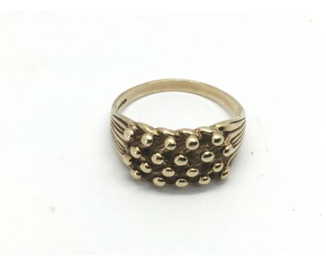 A 9ct gold keeper ring, approx 4.5g and approx size S-T.