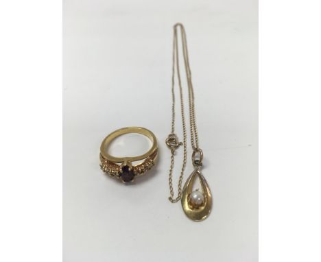 A 9 carat gold chain with attached gold plated pendant set with a pearl, as well as an unmarked ring set with coloured stones