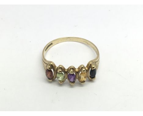 A 9ct gold ring set with five different coloured stones, approx 2g and approx size P.