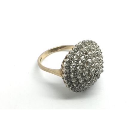 A 9ct gold diamond cluster ring, approx 4.3g.