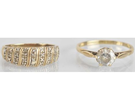 A 9ct yellow gold white stone solitaire ring, size R/S, and a 9ct yellow and white gold wavy textured ring, size O, combined 