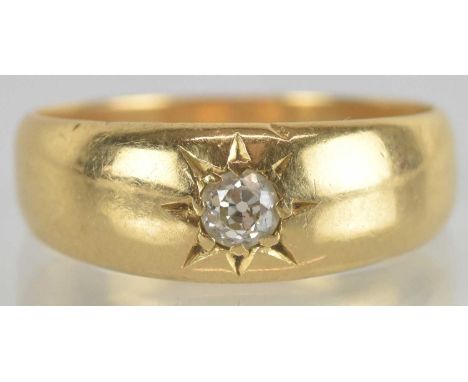 A yellow metal diamond set signet ring, the diamond approx 0.1ct, size M, approx 4.3g.