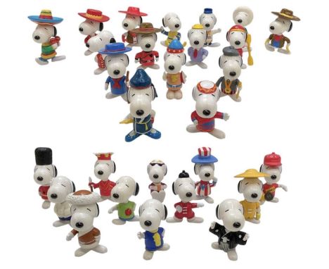 A collection of twenty-nine vintage 1999 McDonald's 'World of Snoopy' figures.